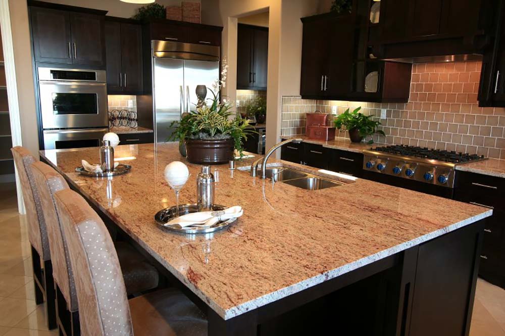 An island adds extra kitchen counter space to an L-shaped kitchen